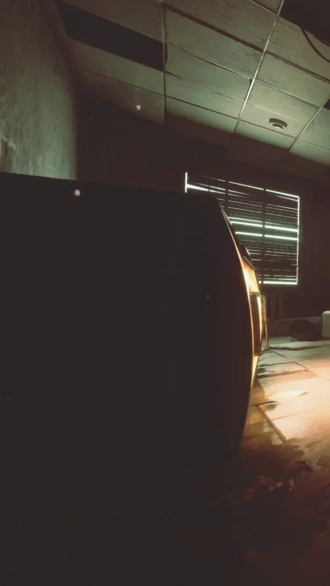 Interior of a building with light shining through a window at night Stock Footage 332211738
