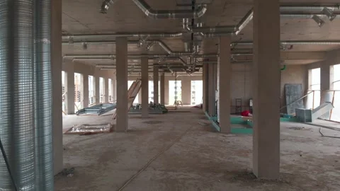 The interior of a building under construction.  Stock Footage 321073571