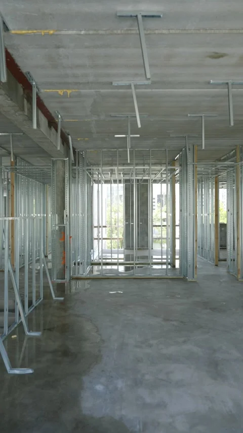 Interior of building under construction specifically focusing on house framing Stock Footage 293850842