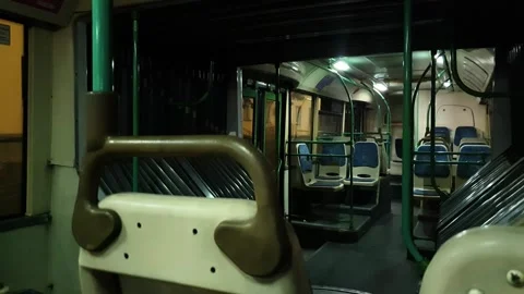 The interior of a bus in the evening, at night, while in motion Stockbeeldmateriaal 343657089