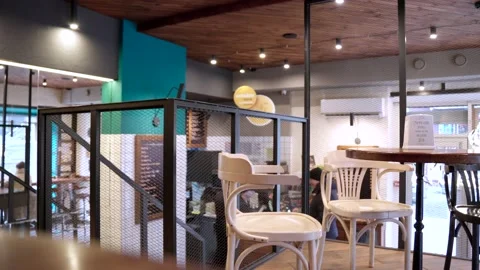 Interior cafe chairs windows and tables Video stock 232944298