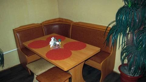 The interior of the cafe with an empty table and sofa. Stockfoto's