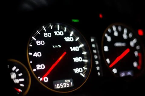 Interior of Car Including Speedometer and Tachometer . Night view Stock Photos