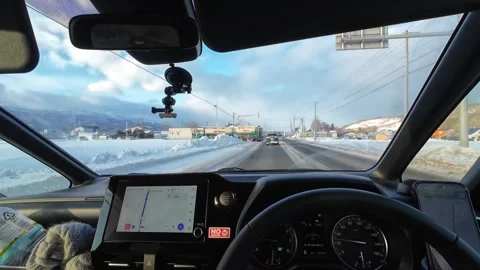 Interior Car POV Drive Through Snowy Town And Mountains Hokkaido Japan Видео 333698973