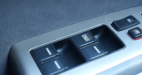 Interior car - pressing window buttons -  2006 year car Stock Footage 128652438