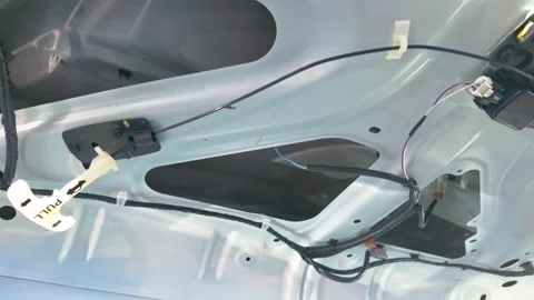 Interior car trunk emergency release latch and mechanical cable Stock Footage 332592740