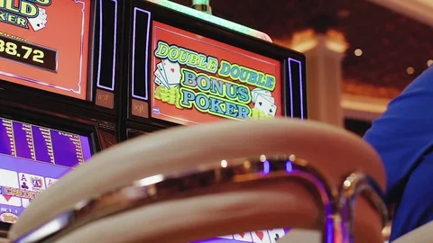 Interior Casino Tilt Down From Ceiling To Slot Machine Gambling Video Poker Stock Footage 71128483