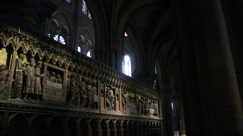 Interior of the cathedral of Notre Dame de Paris with multiple statues Stock Footage 111339839