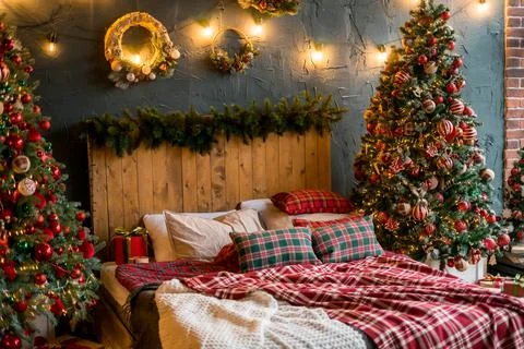 Interior christmas. magic glowing tree, fireplace, gifts in dark at night Stock Photos