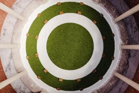 Interior of circular building with columns and grass lawn top view. 3d render Ilustración de archivo