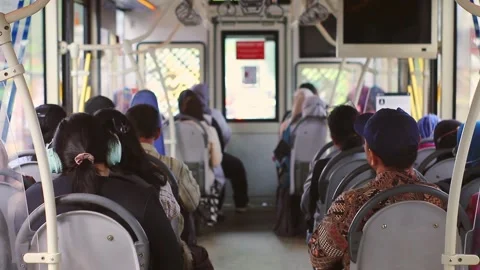 Interior of a city bus with several passengers Stock Footage 330043264