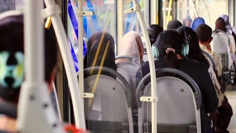Interior of a city bus with several passengers Stock Footage 330043293