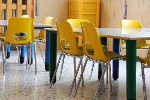 Interior of a classroom in the elementary school completely empty with small  Stock Photos