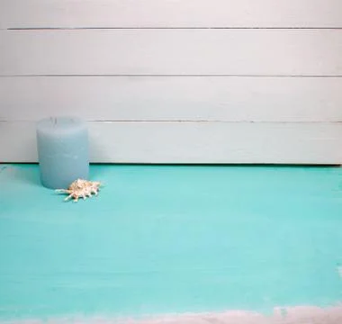 Interior composition with blue candle and sea shell against the background 스톡 사진