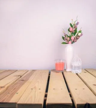 Interior composition home, ceramic vase with flowers on wood table and white  Stock Photos