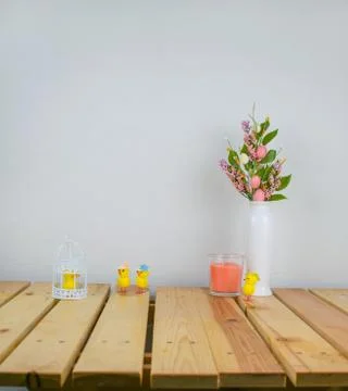Interior composition home, ceramic vase with flowers on wood table and white  Stock-Fotos