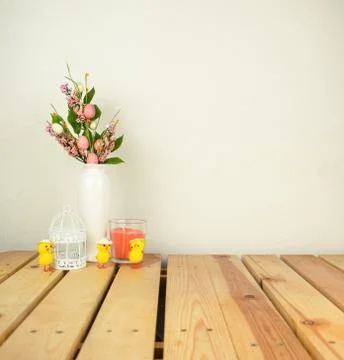 Interior composition home, ceramic vase with flowers, birdcage, candle, small Stock Photos