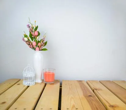 Interior composition home, ceramic vase with flowers on wood table and white  Stock Photos