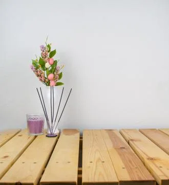 Interior composition home, ceramic vase with flowers on wood table and white  Stock Photos