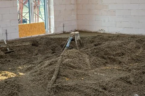 Interior Construction Site with Floor Leveling in Progress Stockfoto's