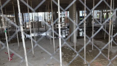 Interior construction site with support columns in Madrid Stock-Footage 334115854