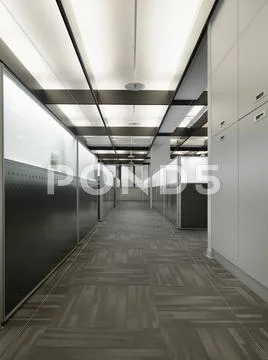 Interior of a contemporary office space with cubicles Stock Photos