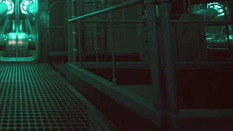 Interior of a control room with green lighting in a submarine setting Stock Footage 344857773