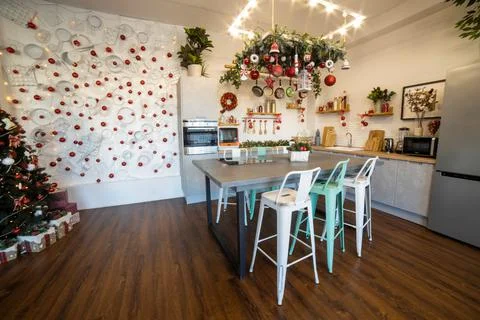 Interior of a cozy modern spacious kitchen for a large family, decorated for the Stock Photos