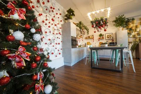 Interior of a cozy modern spacious kitchen for a large family, decorated for the Stock Photos