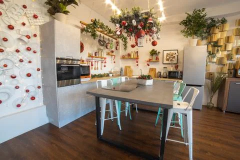 Interior of a cozy modern spacious kitchen for a large family, decorated for the Stock Photos
