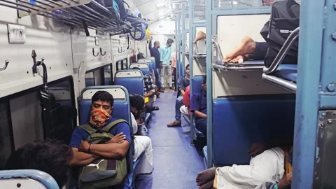 Interior of a crowded Indian train's  second class coach. Stock Footage 315350380
