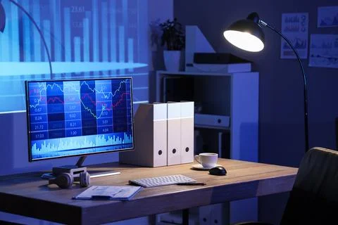 Interior of dark data scientist's office with workplace, glowing lamp and pro Stock Photos