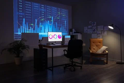 Interior of dark data scientist's office with workplace, glowing lamp and pro Stock Photos