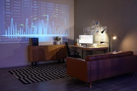 Interior of dark data scientist's office with workplace, projector screen and Stock Photos