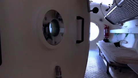 Interior of a decompression chamber for hyperbaric oxygen therapy treatments Stock Footage 149843296