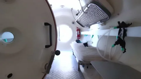 Interior of a decompression chamber for hyperbaric oxygen therapy treatments Stock Footage 149843421