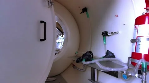 Interior of a decompression chamber for hyperbaric oxygen therapy treatments Stock Footage 149843427