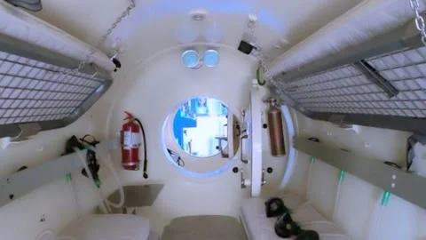Interior of a decompression chamber for hyperbaric oxygen therapy treatments Stock Footage 149843817
