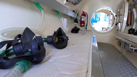 Interior of a decompression chamber for hyperbaric oxygen therapy treatments Stock Footage 149843885