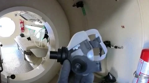 Interior of a decompression chamber for hyperbaric oxygen therapy treatments Stock Footage 149844248