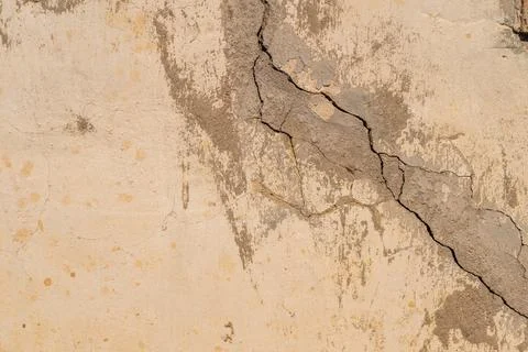 Interior decor featuring crack patterns and earthy tones. Decorative wall s.. Stock Photos