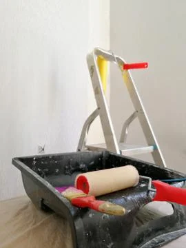 Interior decorating with wallpaper process and tools Foto stock