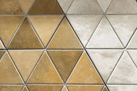Interior decoration materials: Triangular stone walls, brown and grey terra.. Stock Photos