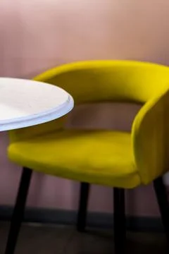 Interior design in a cafe. An empty table and chair in a restaurant. A cozy s Stock Photos