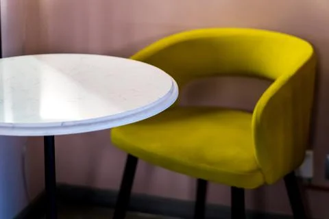 Interior design in a cafe. An empty table and chair in a restaurant. A cozy s Stock Photos