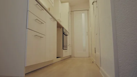 Interior design of clean modern white and black kitchen with stainless steel Video stock 87949980