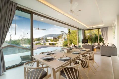 Interior design of dining area in pool villa, house, home, condo and apartmen Stock Photos