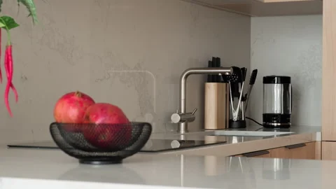 Interior design. Modern kitchen with faucet kitchen island built-in appliances Stock Footage 312468439