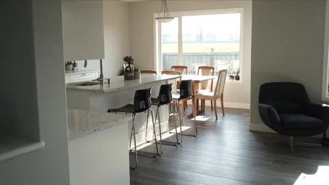 Interior design of a modern white kitchen on a sunny day big picture window Stock-Footage 127208876