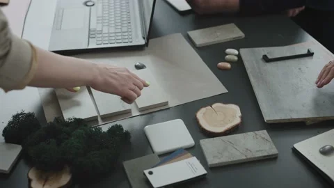 Interior design studio. Designers with architects and clients select solutions Video stock 205597811